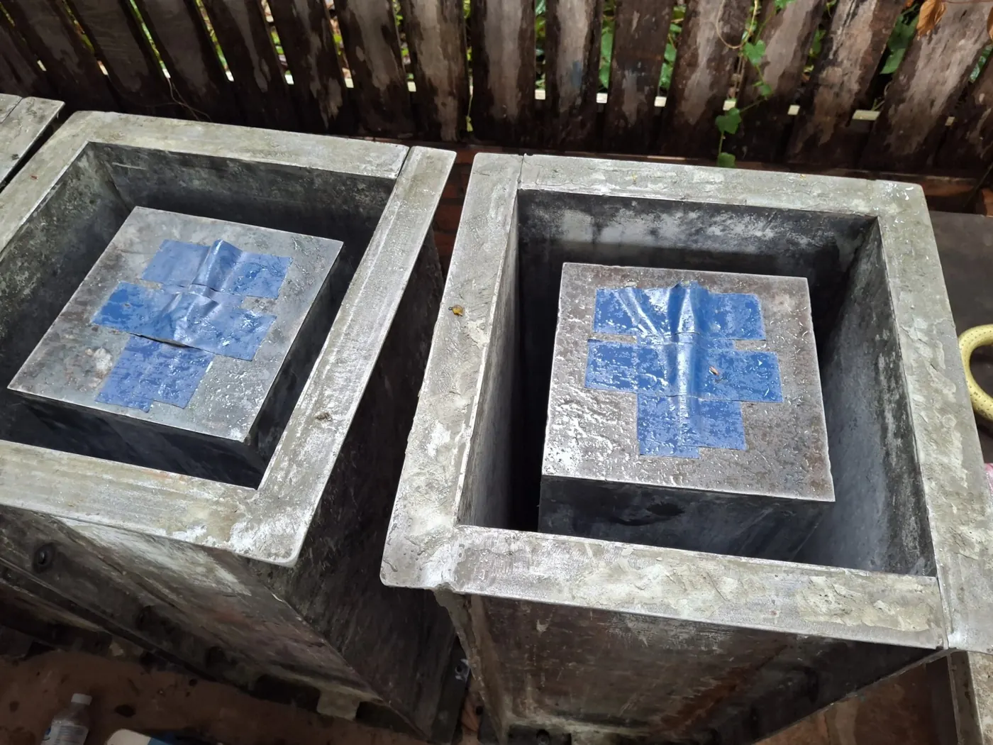 Concrete filter bodies curing at the workshop