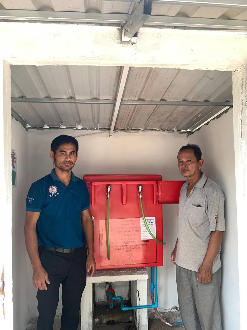 School staff with a newly installed unit