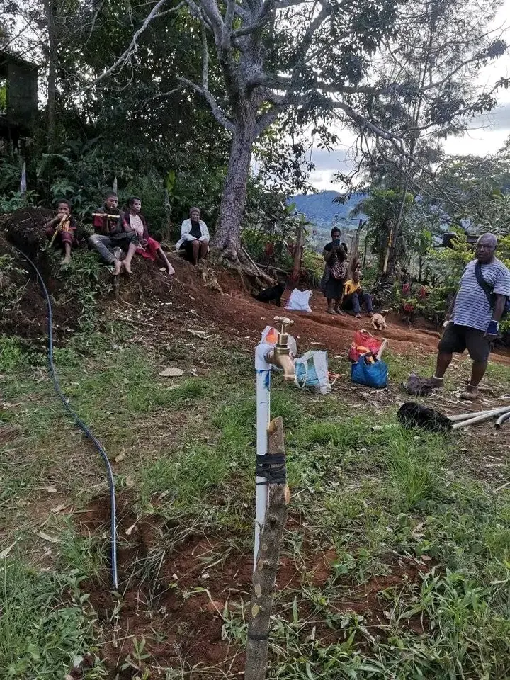 Children at a new village water point