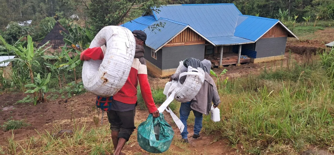 Materials carried up the mountain on foot