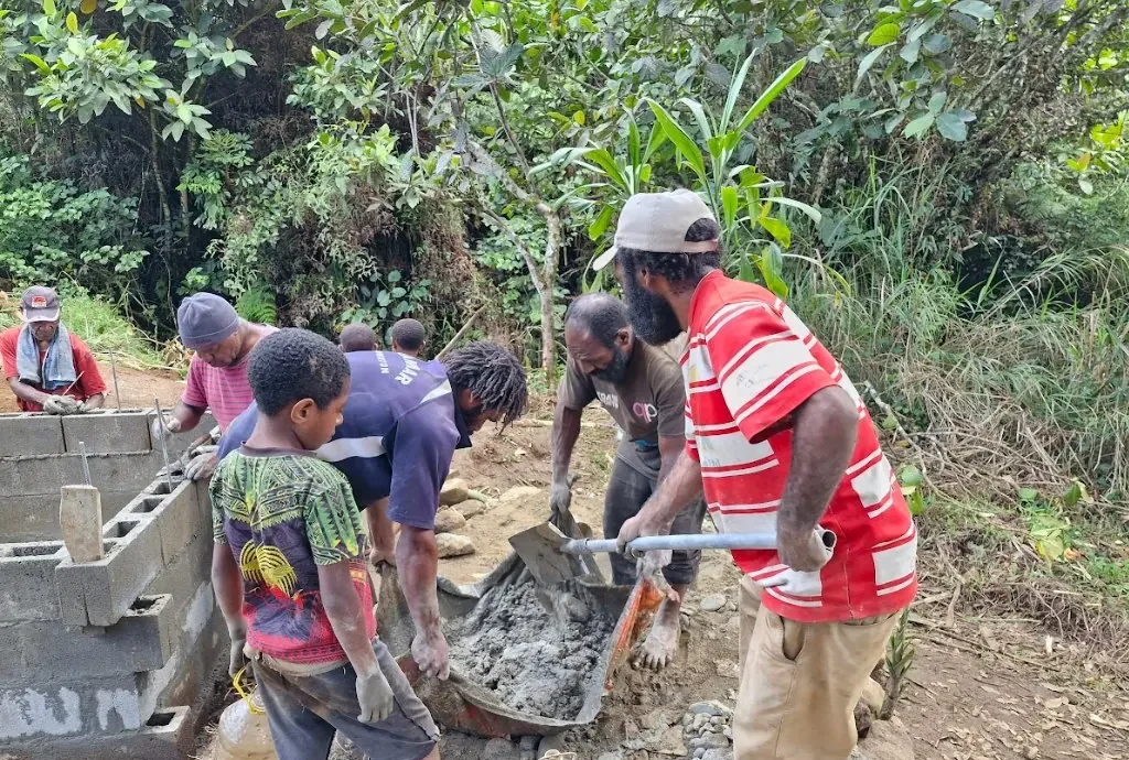 Mixing concrete for the catchment