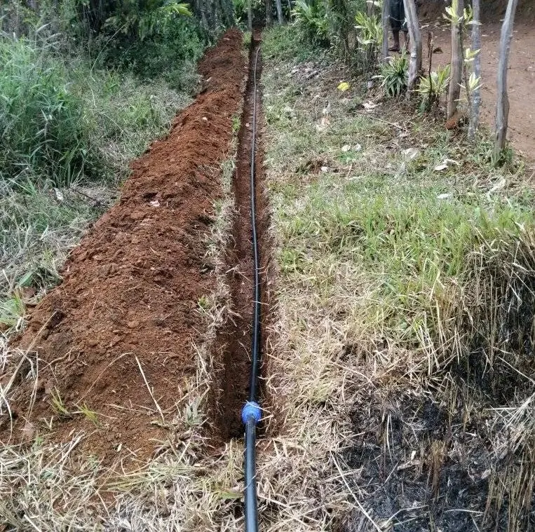 A finished pipe trench through the garden