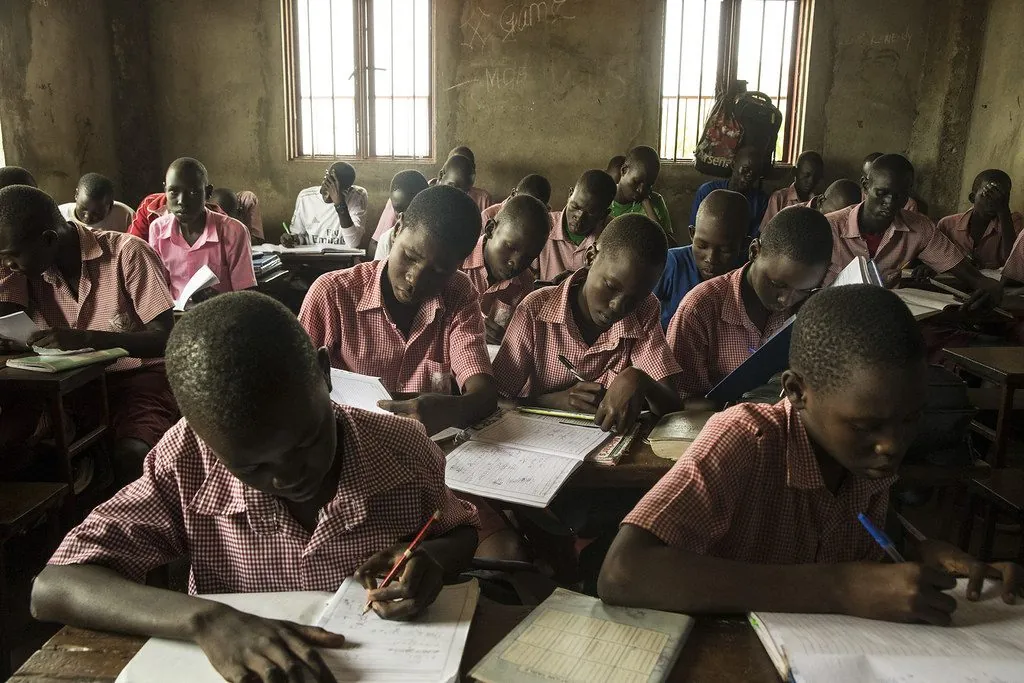Students studying at their desks in a DR Congo classroom